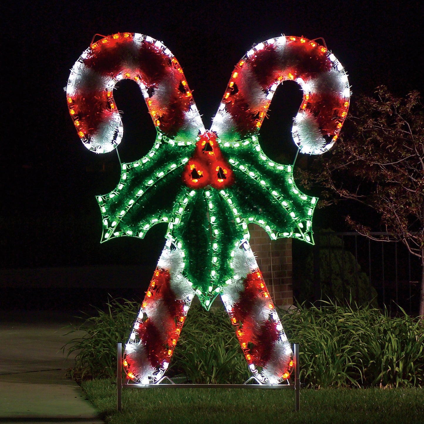 Life-size, giant, candy canes, red bulbs, green bulbs, holiday, traditional outdoor decoration, commercial grade, giant motif, aluminum frame, UV-resistant PVC garland, HolidayLights.com 2021